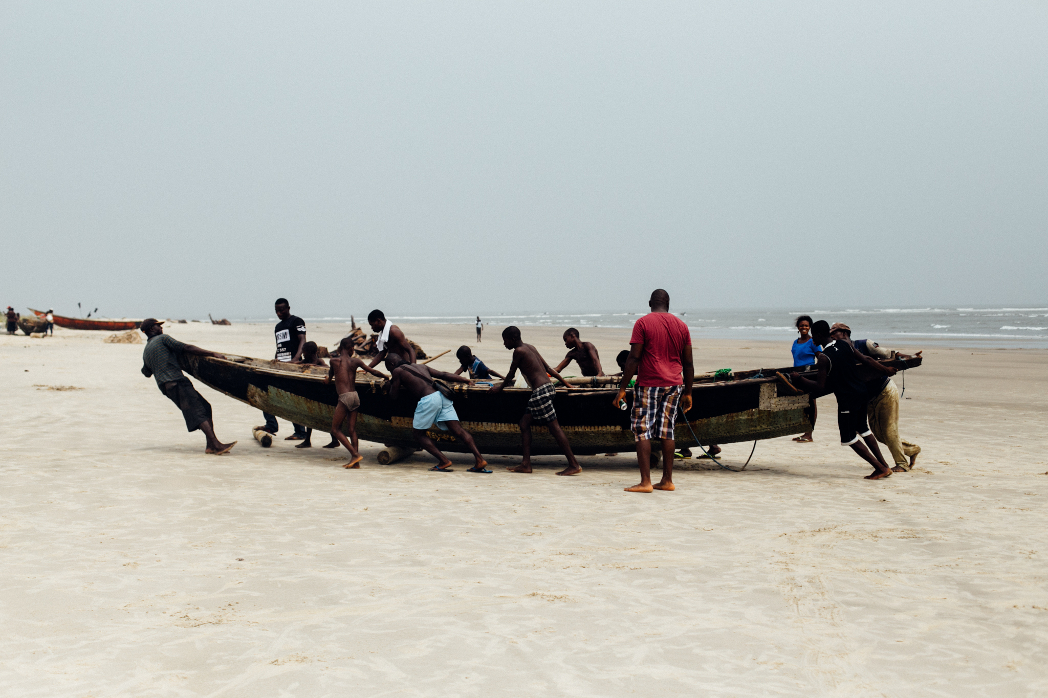 Fishermen bringing the boat home, Ibeno Beach