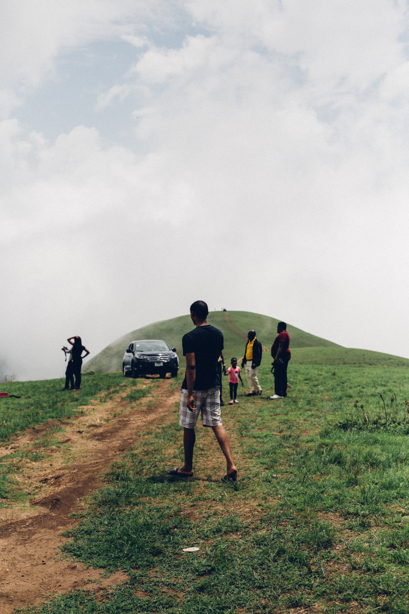 People on a hill top, Obudu