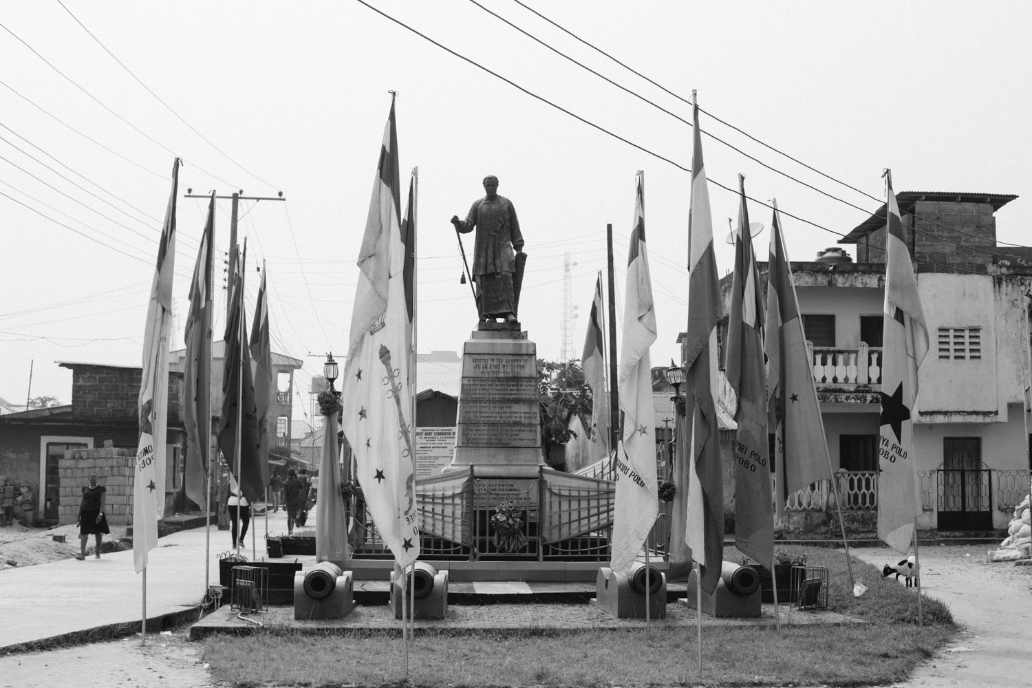 Statue of King Jaja of Opobo showing the flags of the different Compounds or Houses